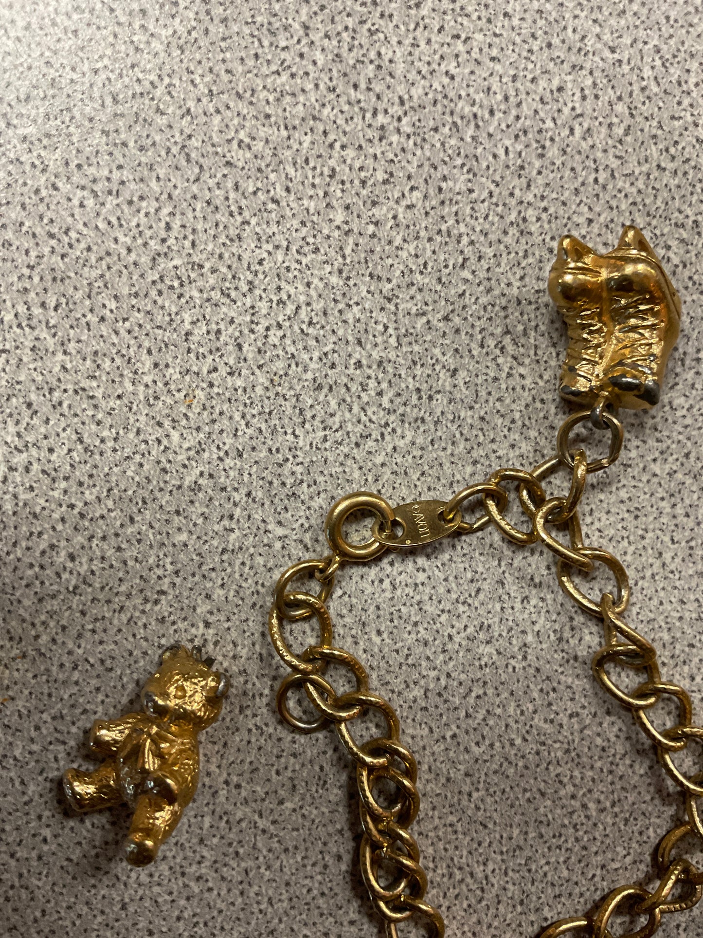 Avon Gold Tone Charm Bracelet
