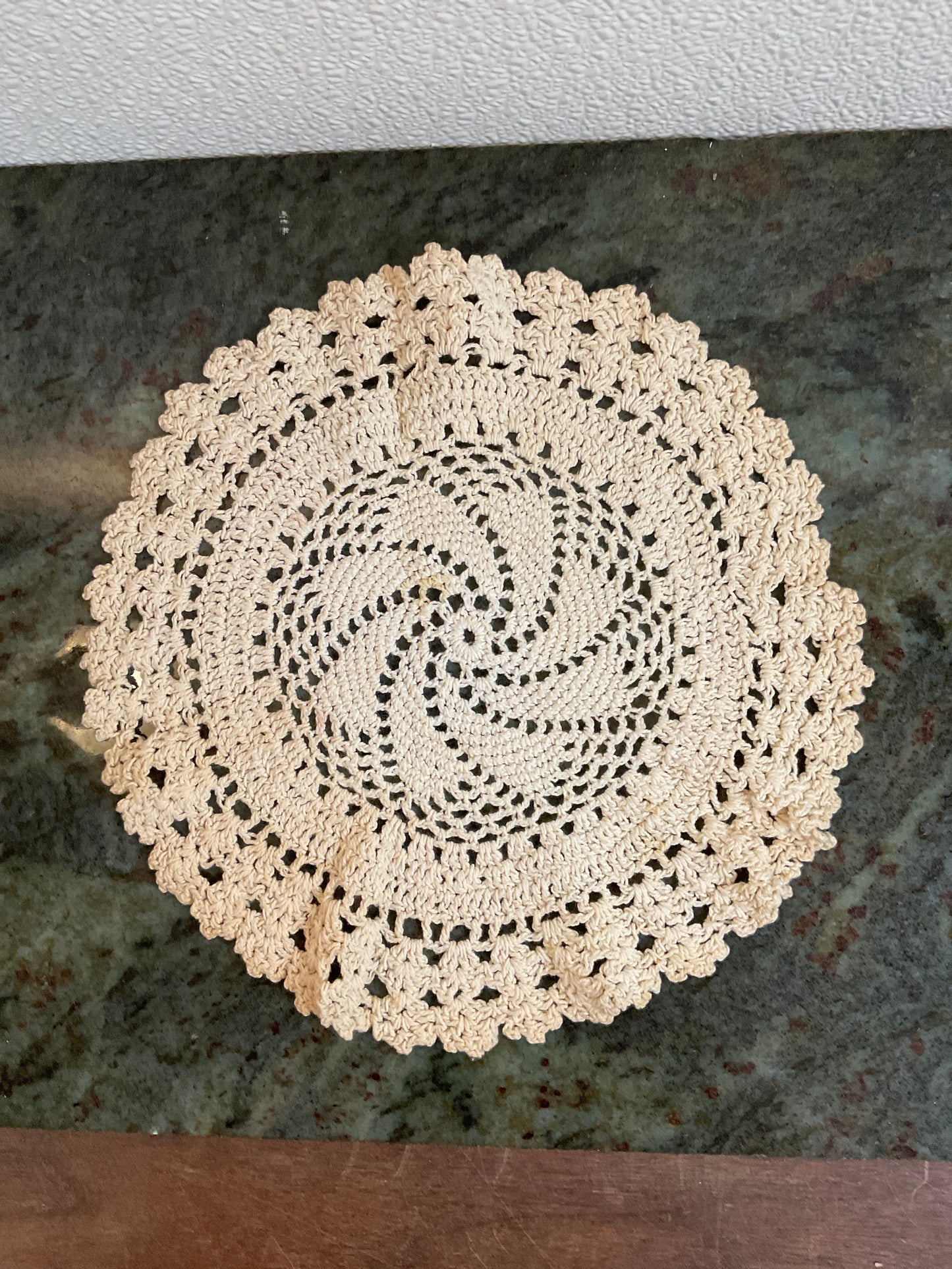 9” Doily with small stain