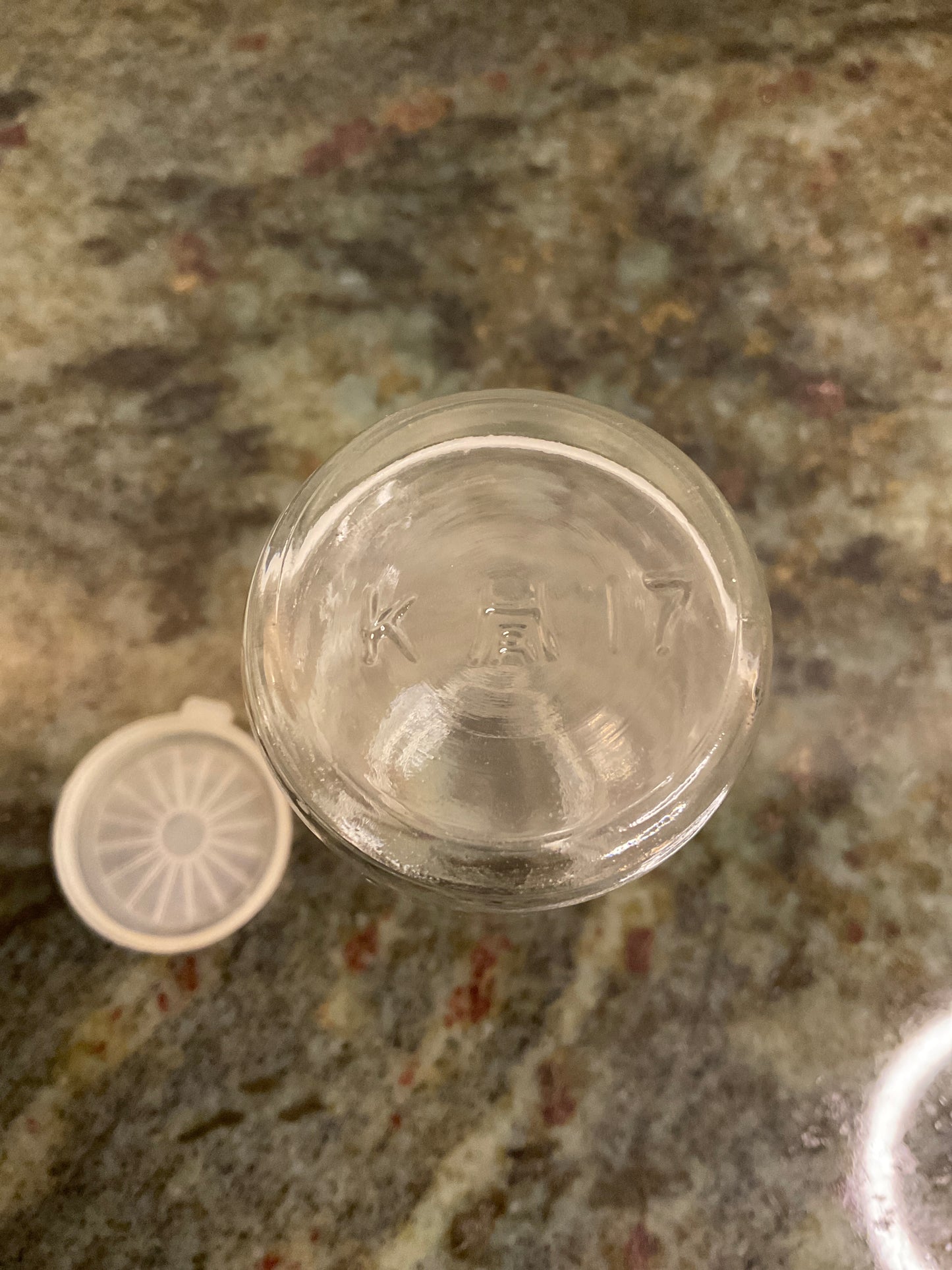 Small glass bottle with lid