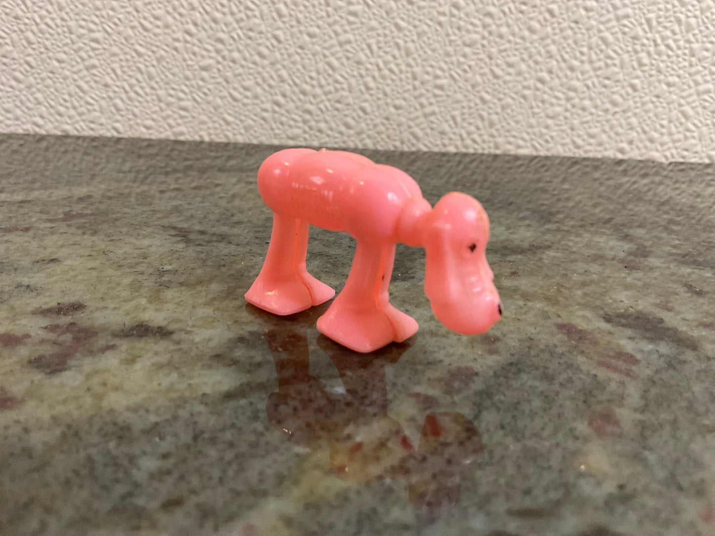 Space Walking Plastic Pink Dog