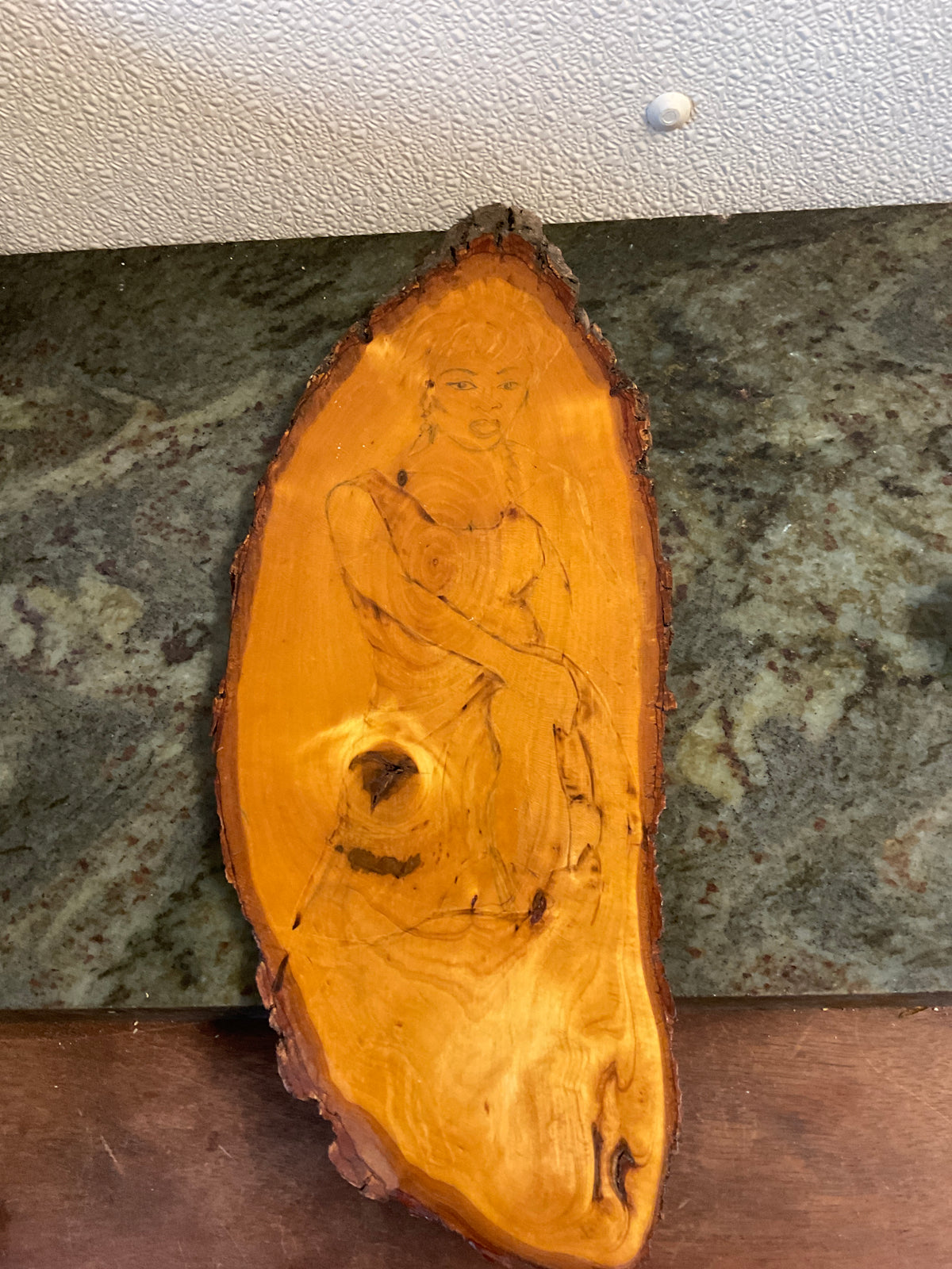 Engraved Lady Figurine Into Wood