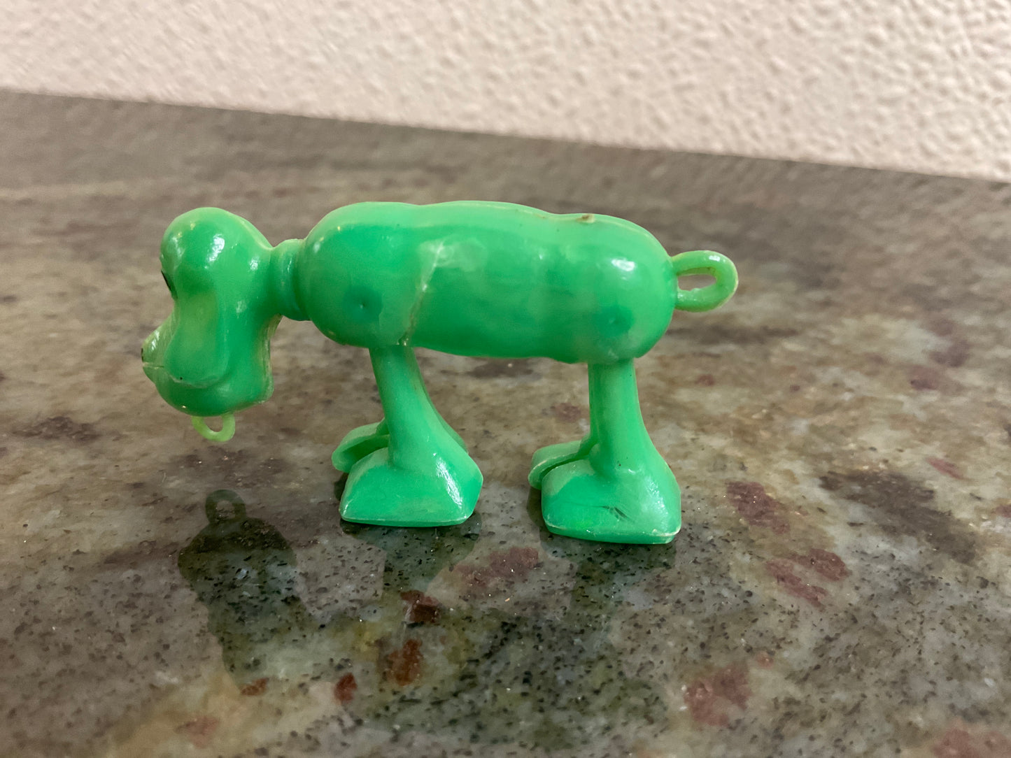 Space Walking Plastic Green Dog