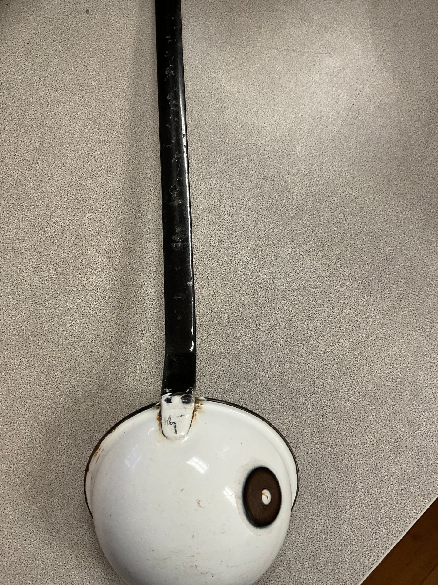 White Enamelware Ladle