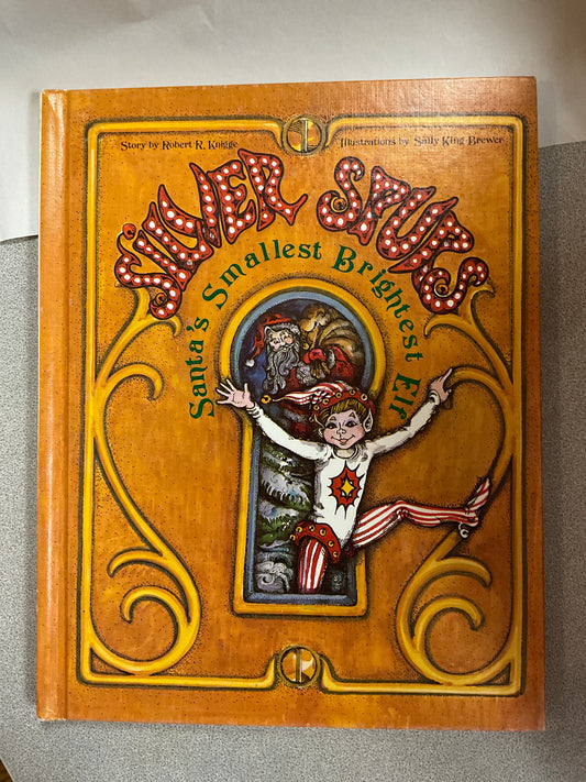 Book & Record Silver Spurs Santa’s Smallest Brightest Elf