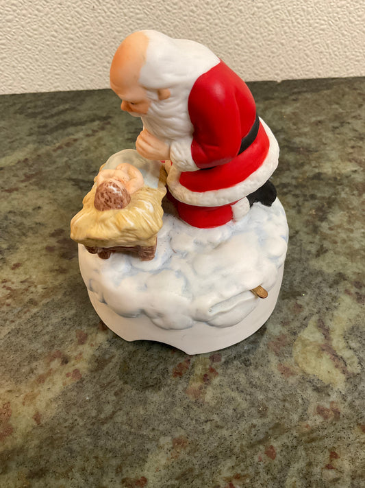 Santa Kneeling with Baby Jesus music box