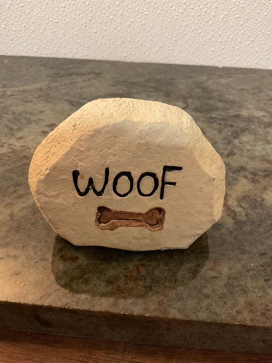 ‘Woof’ with Bone signage