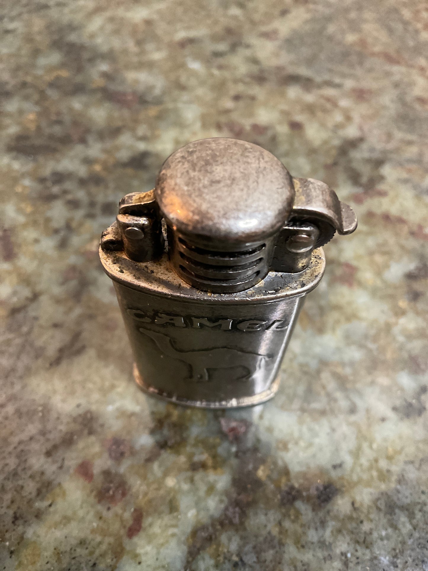 Vintage 1999 Pewter Camel Cigarette Lighter and Box. Lighter is 2 3/8” H.