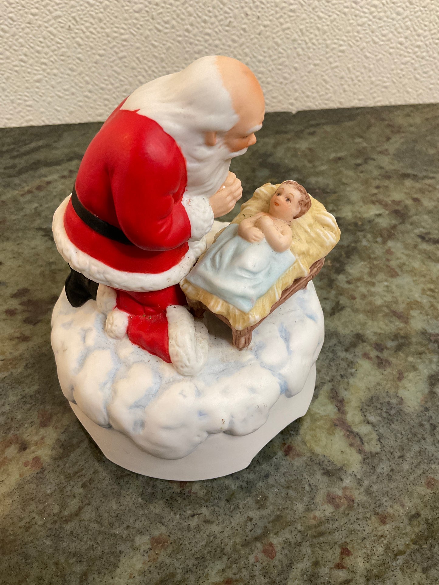 Santa Kneeling with Baby Jesus music box