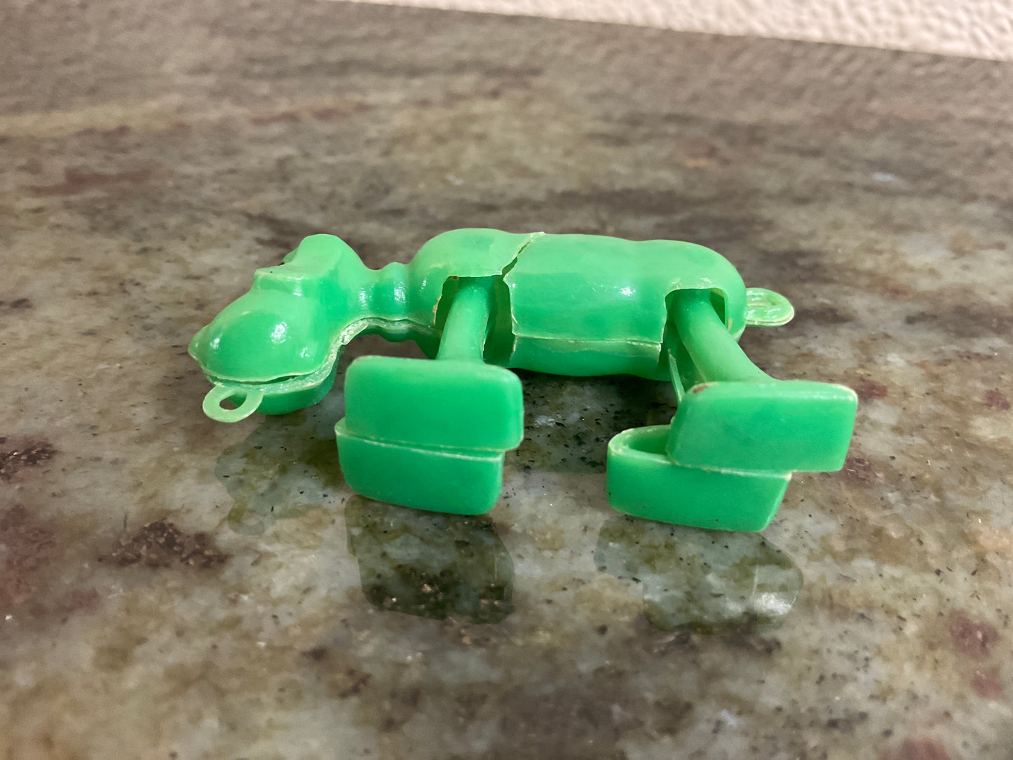 Space Walking Plastic Green Dog