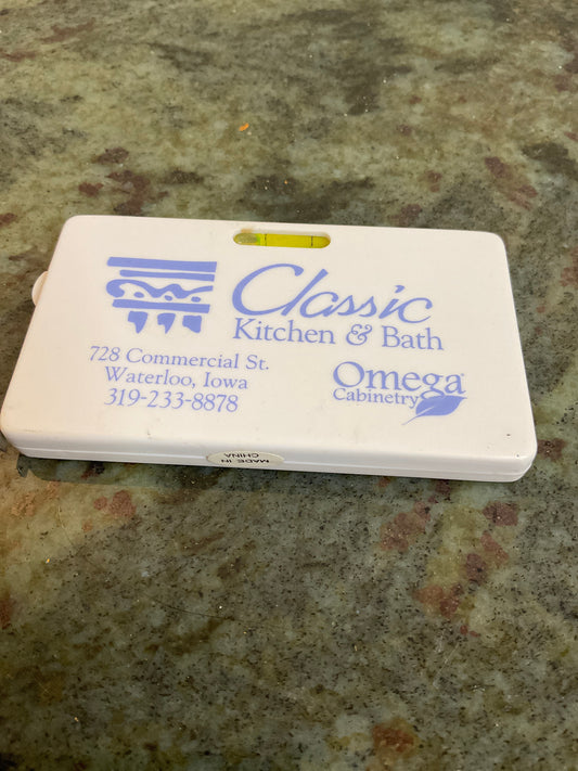 Omega Cabinetry Tape Measure/ Level Advertising