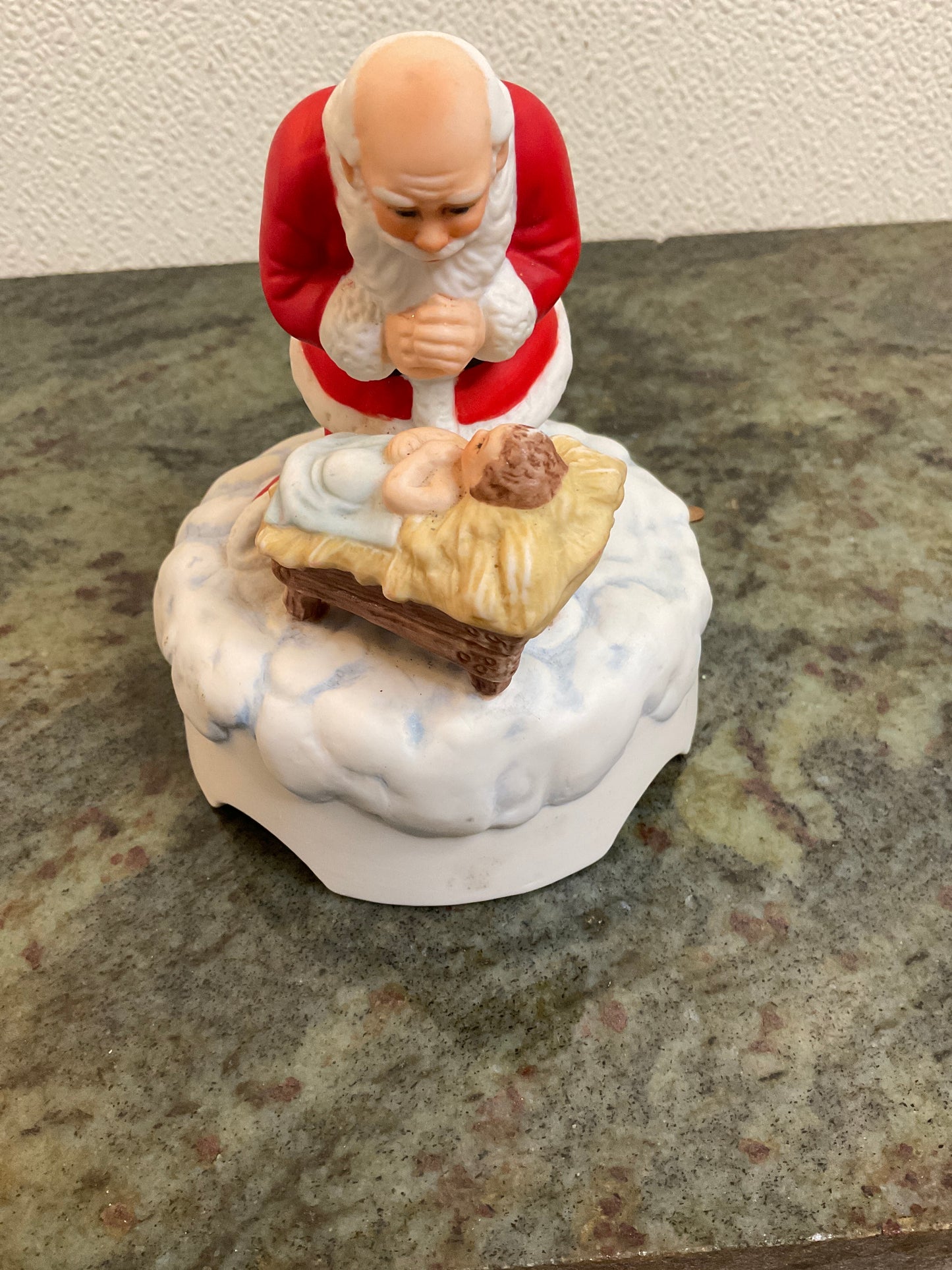 Santa Kneeling with Baby Jesus music box