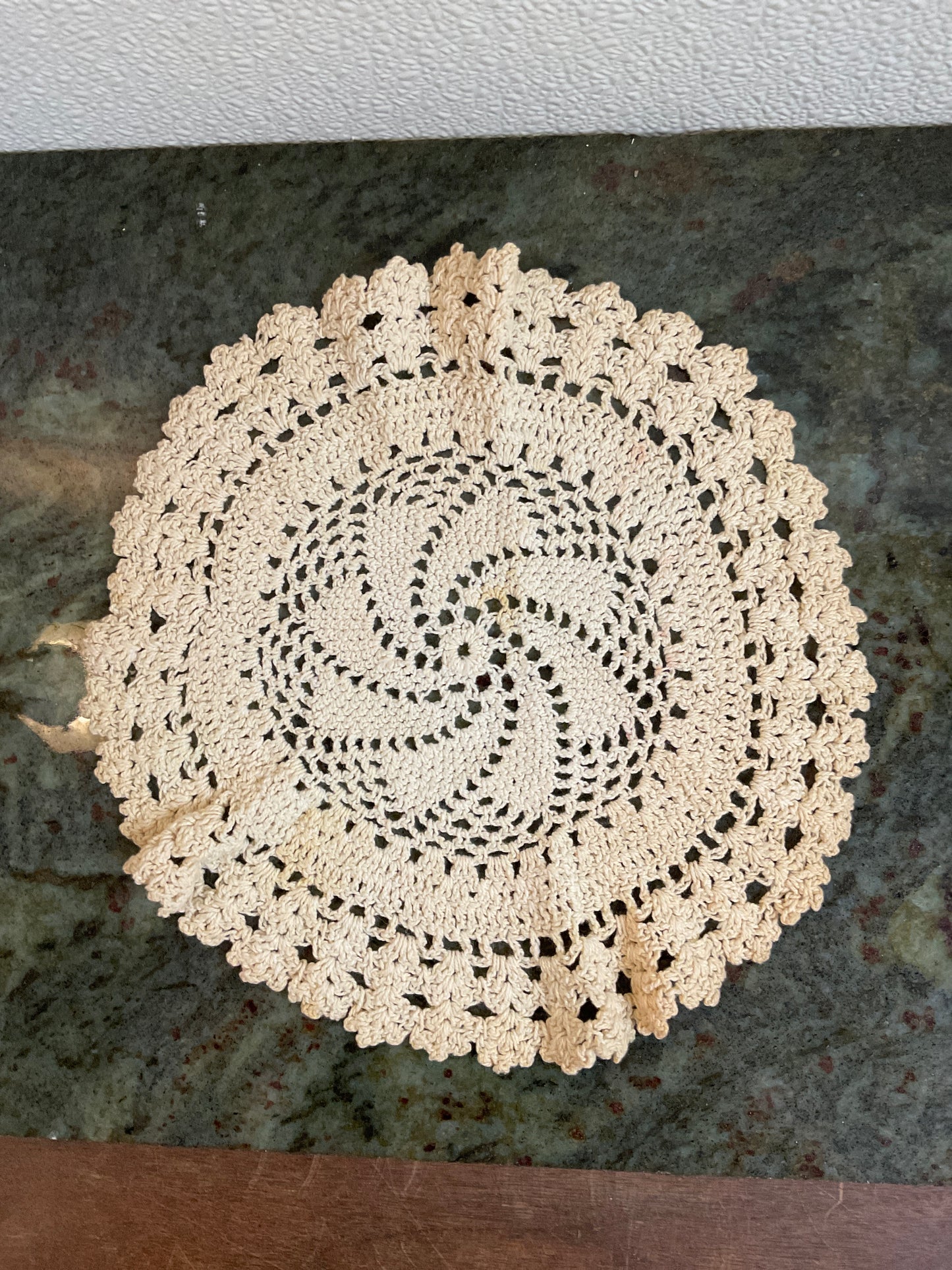 9” Doily with small stain