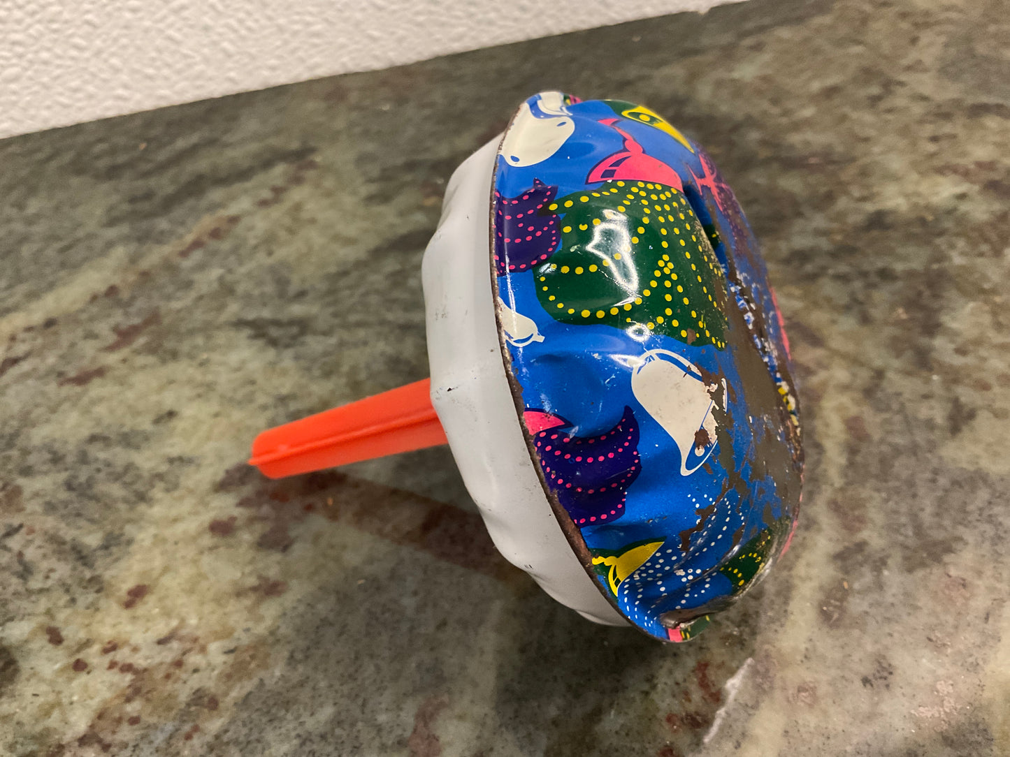 Metal Noise Maker w/Bells & Blue Background