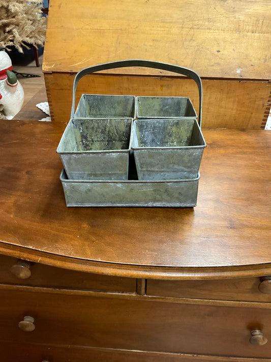 Four Metal Buckets in Carrier