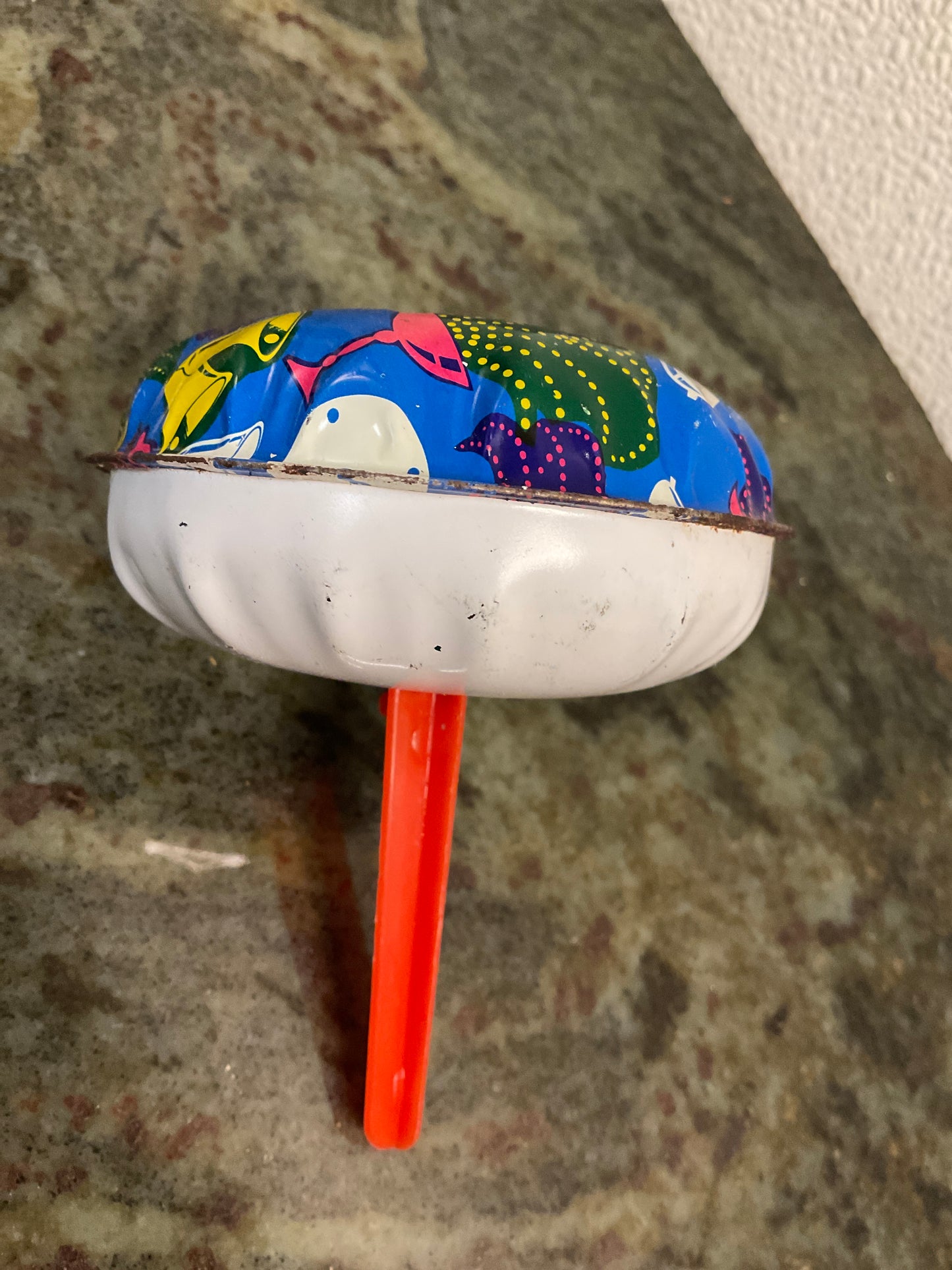 Metal Noise Maker w/Bells & Blue Background