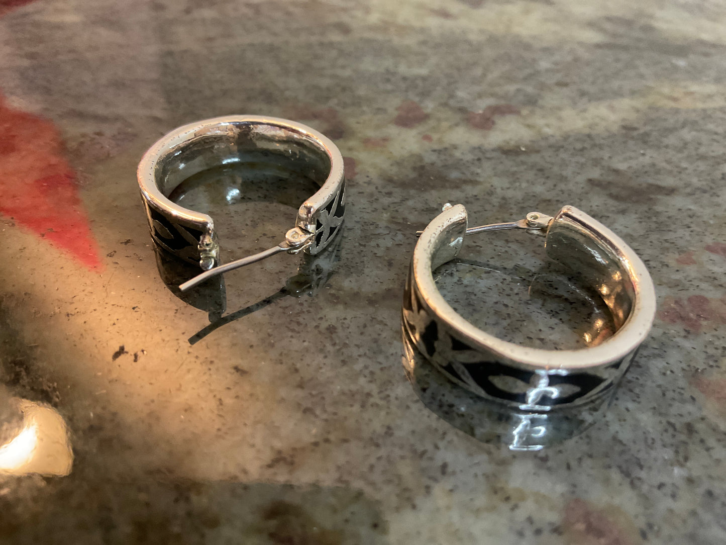 Silvertone Hoop Earrings Black Design