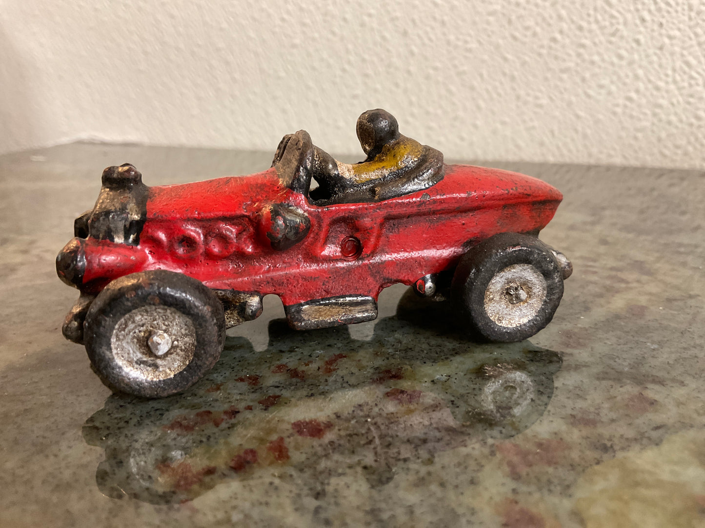 Vintage Cast Iron Toy Boat Tail Racer