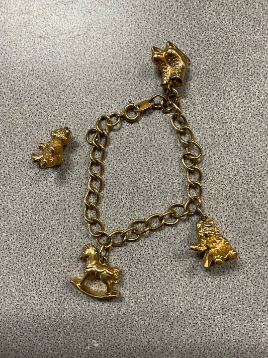 Avon Gold Tone Charm Bracelet