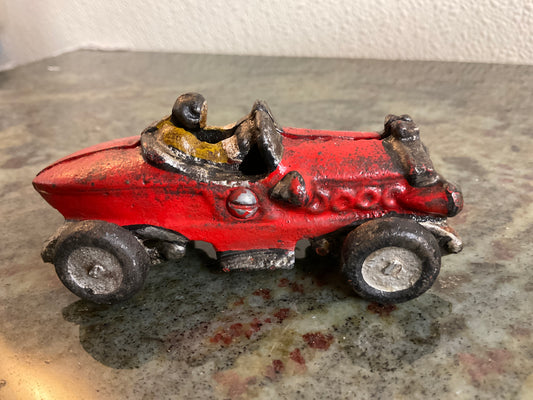 Vintage Cast Iron Toy Boat Tail Racer