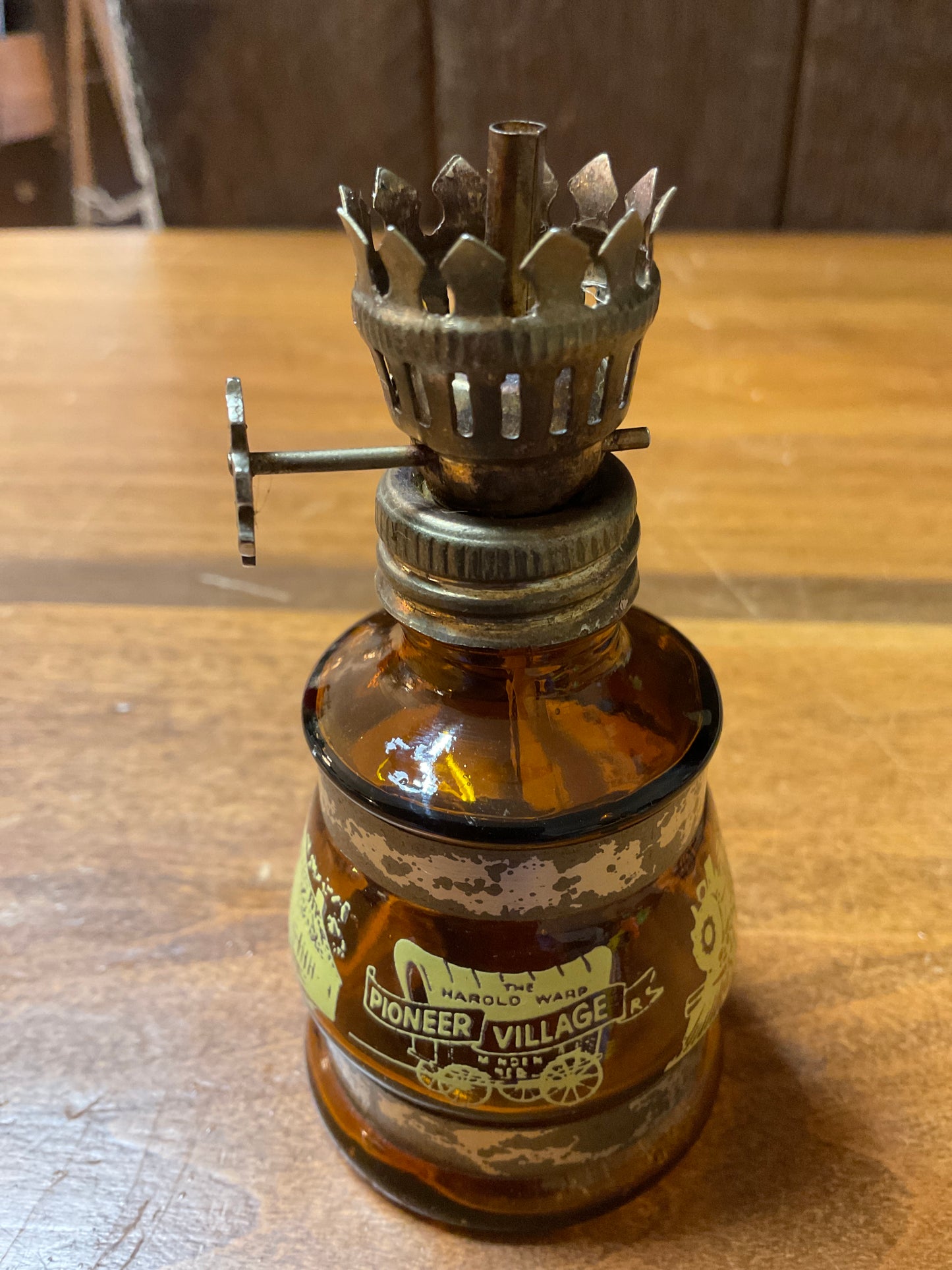 Vtg Mini Amber Oil Lamp w/Pioneer Village Scene. No chimney.