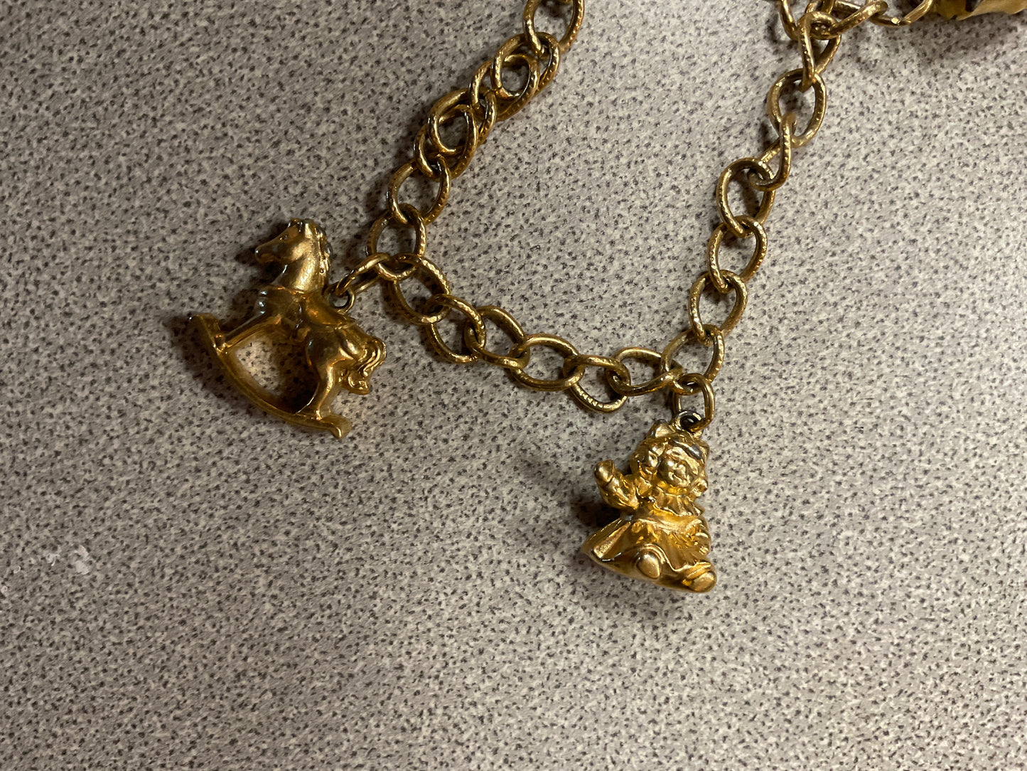 Avon Gold Tone Charm Bracelet