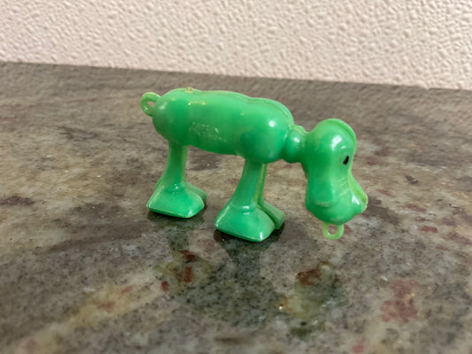 Space Walking Plastic Green Dog