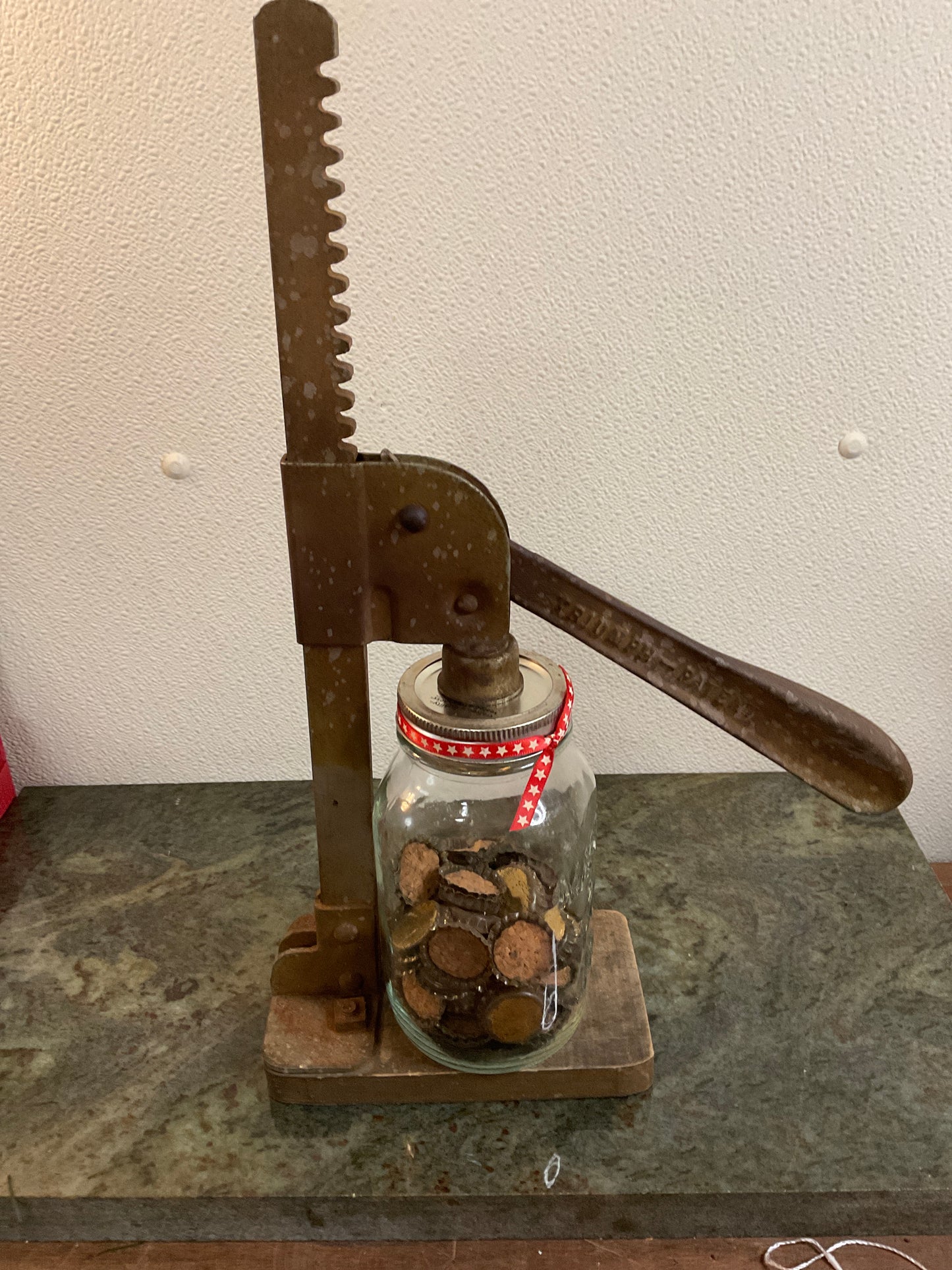 Antique Triumph Bottle Capper And Caps